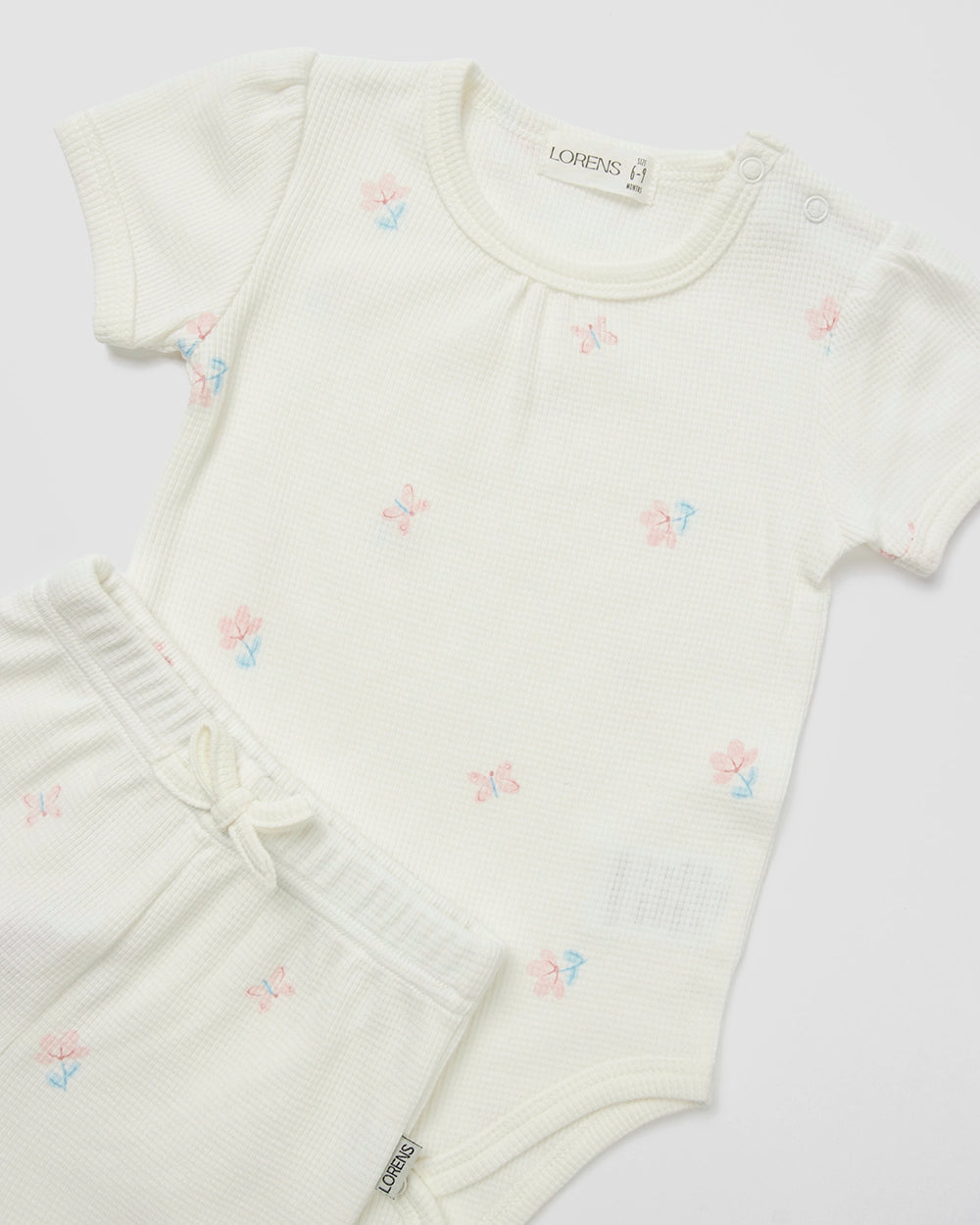 בגד גוף + מכנס קצר פיקה Flowerfly | אופוויט